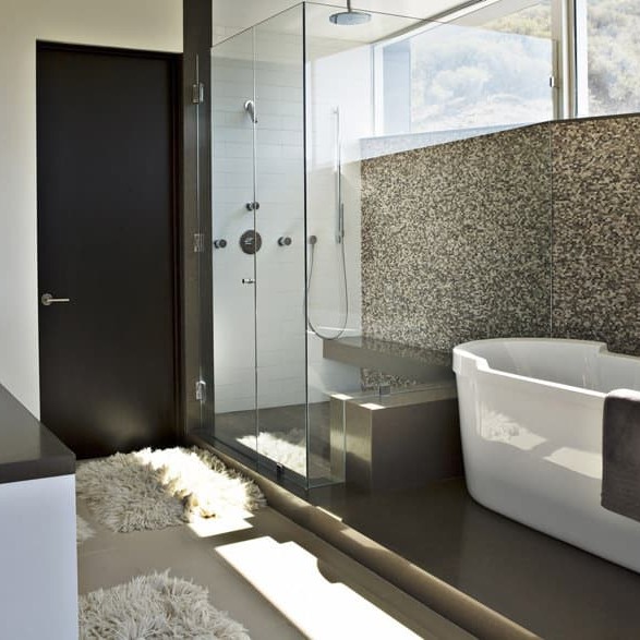 Modern bathroom interior design with pebble blacksplash