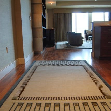 Luxury entryway design with a geometric area rug