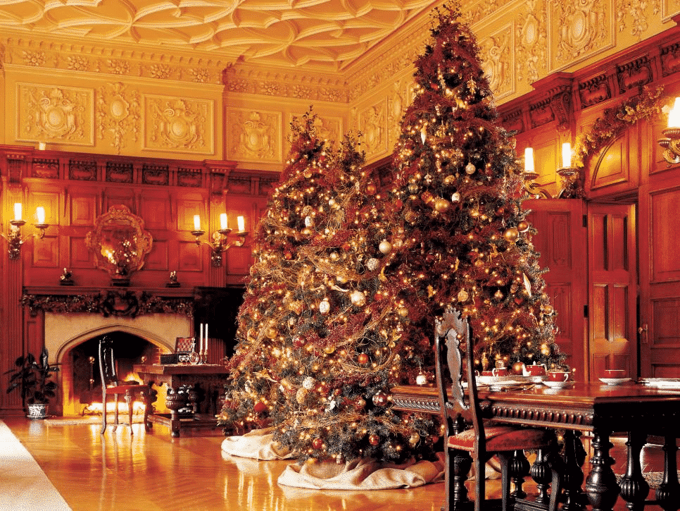 Two large Christmas trees in an extravagant dining area