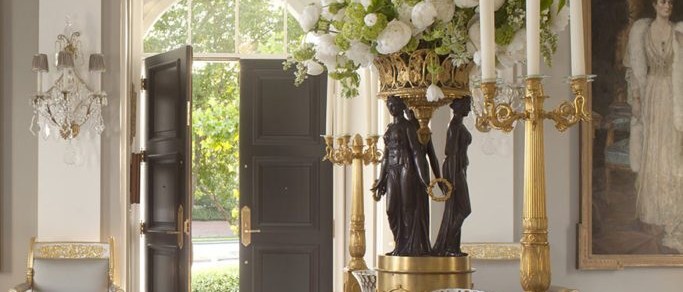 Elegant gold and white entryway design