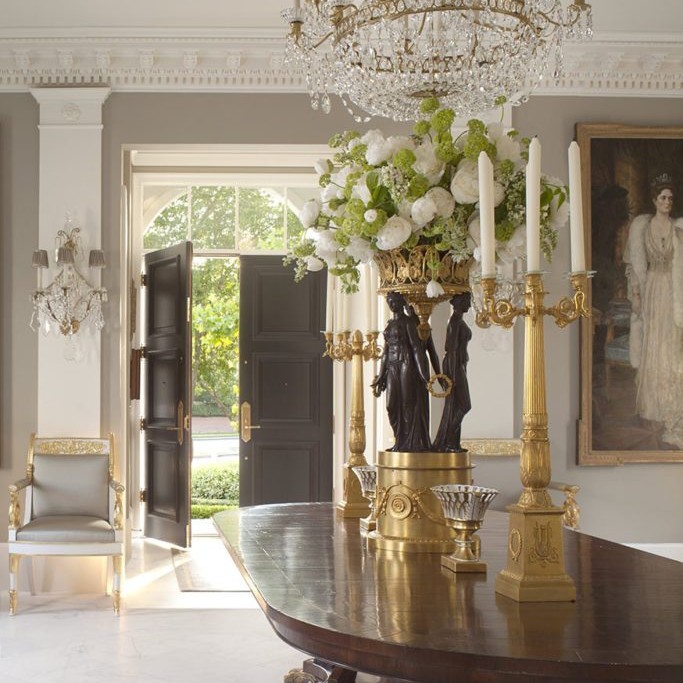 Elegant gold and white entryway design