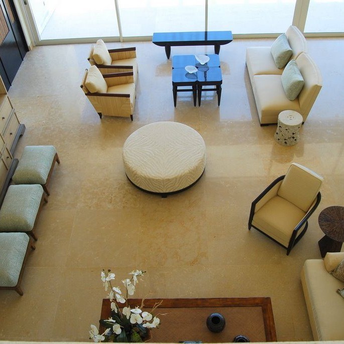 Aerial view of cream and blue seating area design