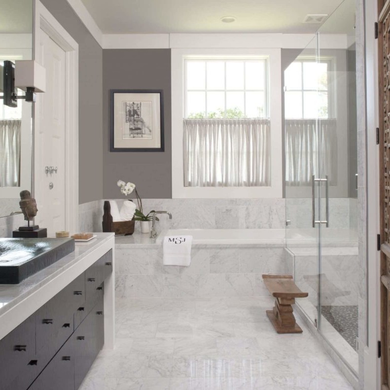 White and silver bathroom design with wood tones