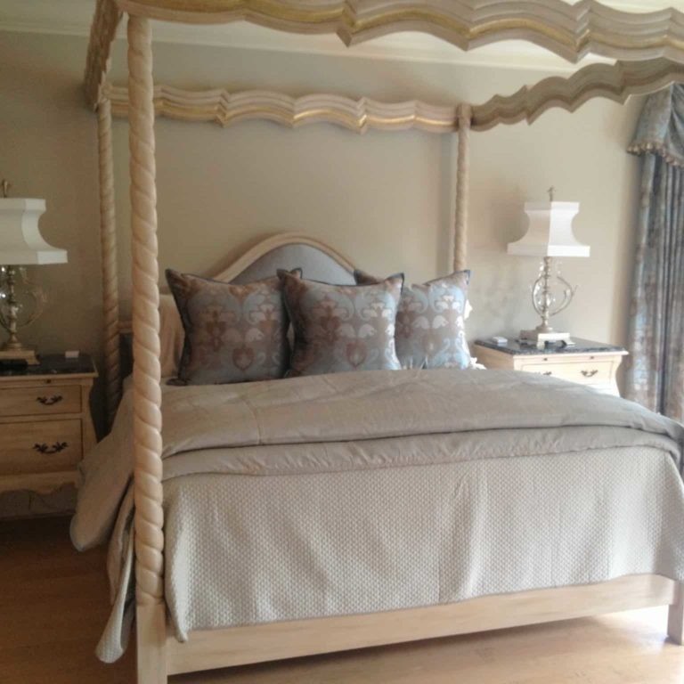Traditional bedroom design with white and blue accent colors
