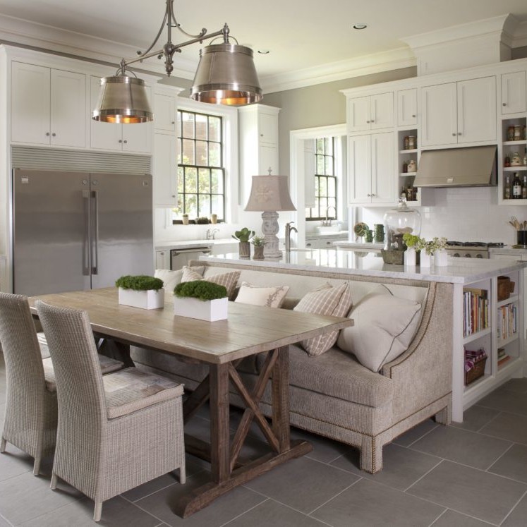 Gray and white interior design of a dining and kitchen area