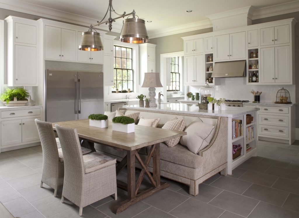 Gray and white interior design of a dining and kitchen area