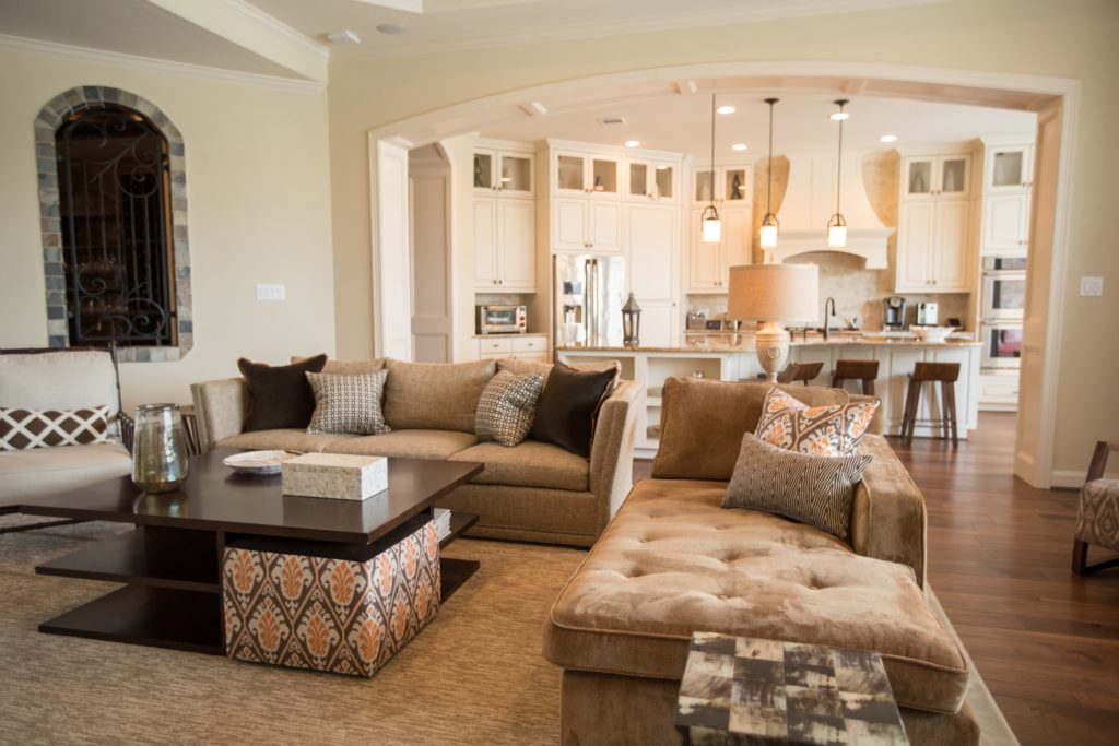 Beige and white living room and kitchen design in Richmond, VA