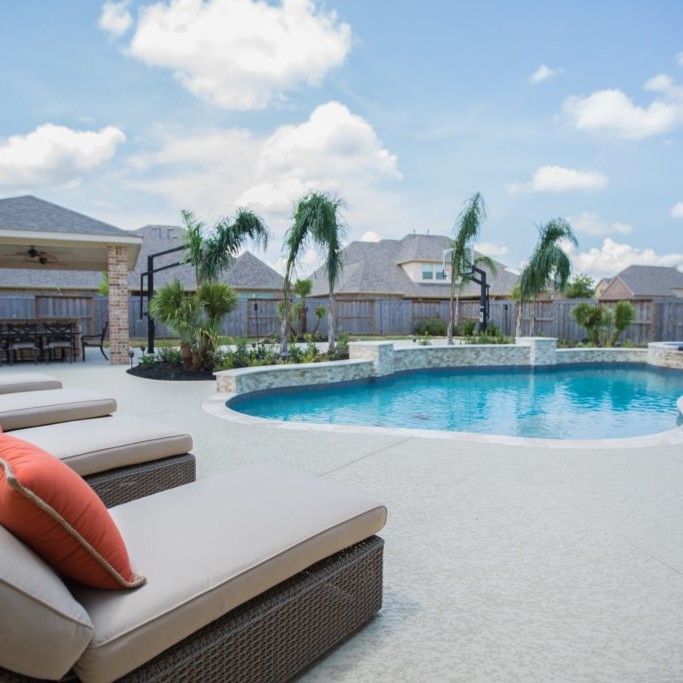 Beautiful patio design with an in-ground pool in Richmond, VA