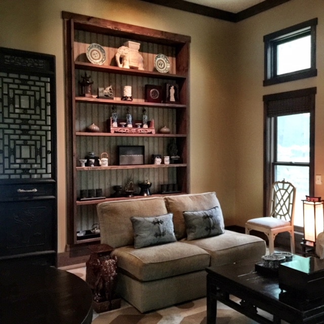 Rustic living room interior design with a shelf full of decor