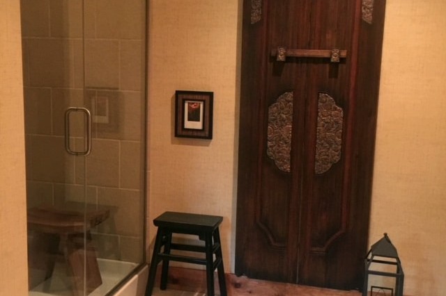 Rustic bathroom interior design with glass shower doors