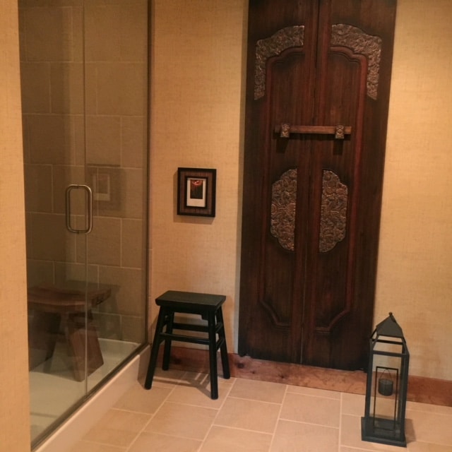 Rustic bathroom interior design with glass shower doors