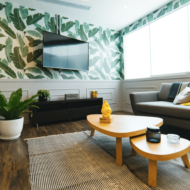 Living room design incorporating yellows and plants