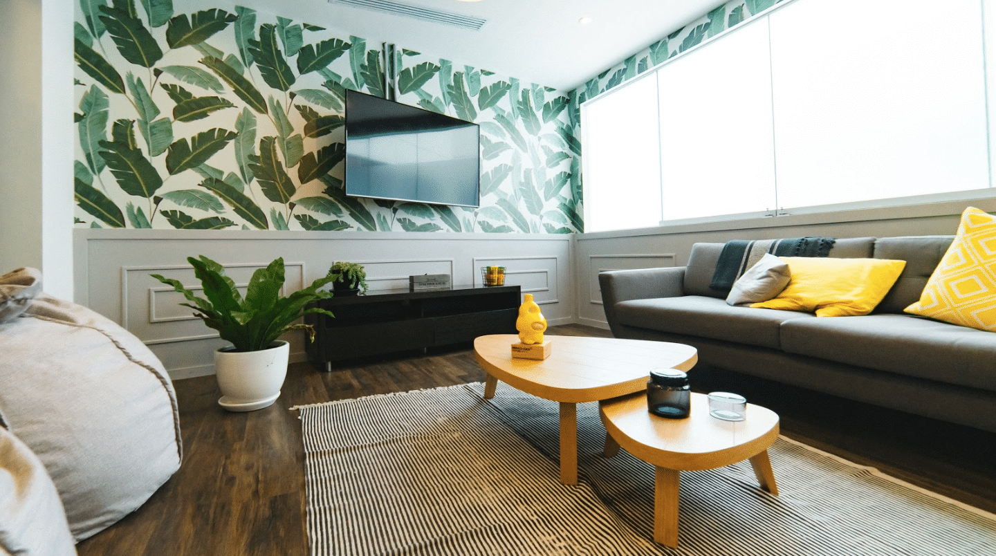 Living room design incorporating yellows and plants